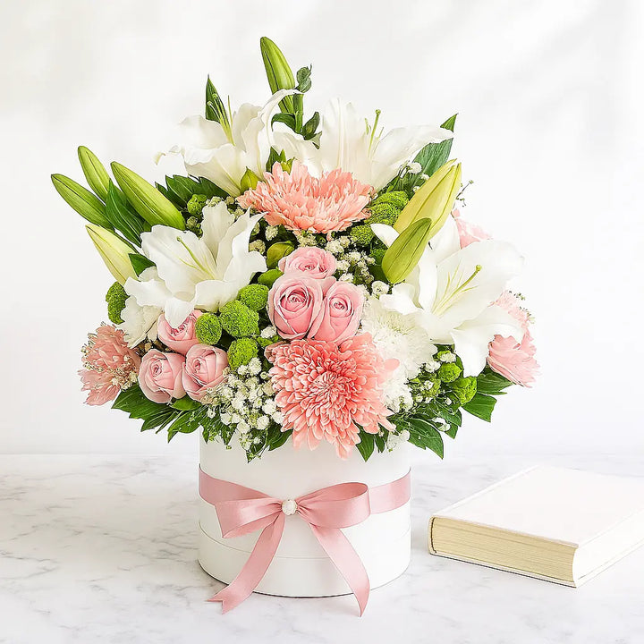 A Round Bouquet of Pink Chrysanthemums, Lilies, and Roses
