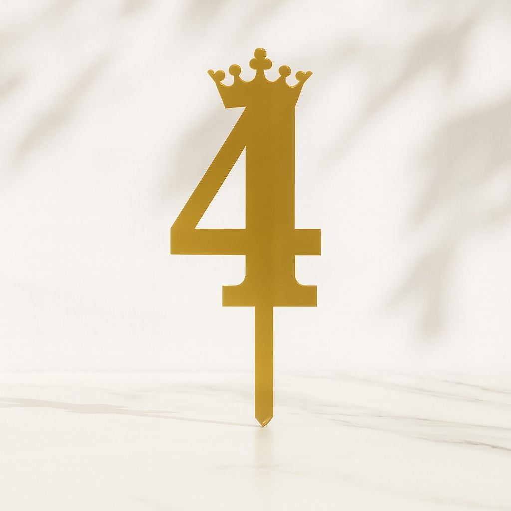 Gold number '4' with a crown on a white background