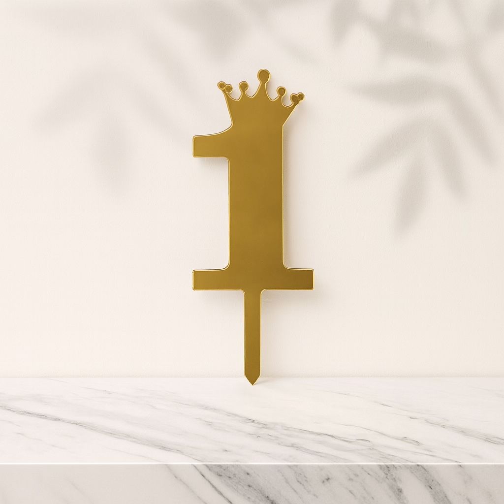 Gold number '1' with a crown on a marble surface